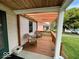 Relaxing outdoor wood deck with a pergola offers a charming space to unwind and enjoy the weather at 5450 E 18Th St, Indianapolis, IN 46218