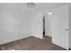 Bright bedroom featuring neutral carpet, white trim, and a closet at 555 S Auburn St, Indianapolis, IN 46241