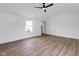 Bedroom has lots of natural light and wood-look flooring at 555 S Auburn St, Indianapolis, IN 46241