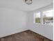 Well lit bedroom featuring dual windows and carpet flooring at 555 S Auburn St, Indianapolis, IN 46241