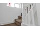 Carpeted stairway with white wood trim at 555 S Auburn St, Indianapolis, IN 46241