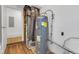 Water heater and HVAC unit are found in utility area at 555 S Auburn St, Indianapolis, IN 46241