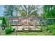 Spacious backyard deck perfect for outdoor dining, with a gazebo, seating, and landscaped surroundings at 5750 W 650 N, Thorntown, IN 46071