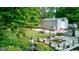 Enjoy the large backyard deck, perfect for entertaining and surrounded by lush greenery at 5750 W 650 N, Thorntown, IN 46071