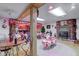 Finished basement with a brick fireplace and retro soda fountain bar area at 5750 W 650 N, Thorntown, IN 46071