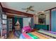 Bedroom featuring hardwood floors and an adjoining sitting room at 5750 W 650 N, Thorntown, IN 46071