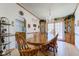 Charming dining area with a wooden table, chandelier, and decorative wall accents, perfect for Gathering gatherings at 5750 W 650 N, Thorntown, IN 46071
