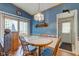 Cozy dining area with an adjacent entry and natural light; ideal for Gathering meals at 5750 W 650 N, Thorntown, IN 46071