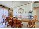 Elegant dining room with wood table set, chandelier, and decorative accents creating a warm and inviting space at 5750 W 650 N, Thorntown, IN 46071