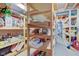 Basement storage room with extensive wooden shelving for organized storage at 5750 W 650 N, Thorntown, IN 46071