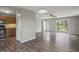 Open living space with adjacent kitchen provides the perfect area for entertaining guests or simply relaxing at 6231 W Clinton St, Stilesville, IN 46180