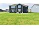 Large, well-maintained backyard featuring a patio area and plenty of space for outdoor activities at 6398 Marden Trl, Brownsburg, IN 46112