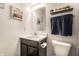 Charming bathroom featuring a vanity, mirror, and stylish decor at 6559 Ambrosia Ln, Pendleton, IN 46064