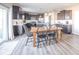Eat-in kitchen features stainless steel appliances, dark cabinetry, and modern countertops at 657 Kilmore Dr, Pendleton, IN 46064