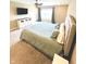 Neutral main bedroom featuring a ceiling fan, large bed, TV and large window at 657 Kilmore Dr, Pendleton, IN 46064