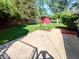 Enjoy the spacious backyard with its private shed and manicured lawn, offering plenty of space for outdoor activities at 7017 Mc Lain Dr, Indianapolis, IN 46217