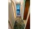 Hallway with carpeted floor and multiple doorways at 7017 Mc Lain Dr, Indianapolis, IN 46217