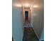 Cozy hallway with neutral walls and plush carpeting at 7017 Mc Lain Dr, Indianapolis, IN 46217