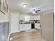 Bright kitchen featuring white cabinetry, stainless steel appliances, and modern countertops at 710 Marie Ln, Fortville, IN 46040
