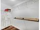 Practical walk-in closet with shelving, hanging rods, and hardwood floors at 710 Marie Ln, Fortville, IN 46040