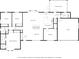 Detailed floor plan featuring the layout of bedrooms, living room, kitchen, and garage at 7135 Lantern Rd, Indianapolis, IN 46256