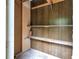 Interior of outbuilding includes shelves for storage or organizing any household goods at 7135 Lantern Rd, Indianapolis, IN 46256
