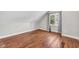 Bright attic with hardwood floors and ample natural light from the window at 715 Terrace Ave, Indianapolis, IN 46203