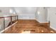 Spacious attic features hardwood floors, built-in shelving, and natural light at 715 Terrace Ave, Indianapolis, IN 46203