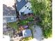 Aerial view of a backyard featuring a patio, fire pit, lawn, and shed at 715 Terrace Ave, Indianapolis, IN 46203