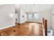 Spacious living room with hardwood floors, neutral walls, high ceilings, and plenty of natural light at 715 Terrace Ave, Indianapolis, IN 46203