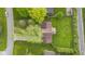 An aerial view of a charming home with a spacious yard and mature trees at 7153 N Audubon Rd, Indianapolis, IN 46250