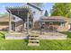 A spacious deck with pergola offers a perfect spot for outdoor dining and relaxation at 7153 N Audubon Rd, Indianapolis, IN 46250