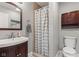 Bathroom boasts modern fixtures, a stylish vanity, and a shower with tiled walls at 7153 N Audubon Rd, Indianapolis, IN 46250