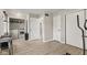 Versatile bonus room with laundry, storage, and exercise area at 7153 N Audubon Rd, Indianapolis, IN 46250