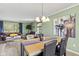 Bright dining area connected to a comfortable living room, perfect for Gathering gatherings at 7153 N Audubon Rd, Indianapolis, IN 46250