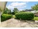 Backyard with large patio and privacy hedges at 7250 Hoover Rd, Indianapolis, IN 46260