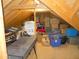 Unfinished attic with ample storage, offering a flexible space for various needs and future possibilities at 7897 Hickory Ridge Ln, Mooresville, IN 46158