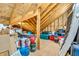 Spacious unfinished attic with wooden beams, insulation, and room for storage at 7897 Hickory Ridge Ln, Mooresville, IN 46158