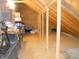Spacious unfinished attic offers versatile potential for storage, workshop, or customizable living area at 7897 Hickory Ridge Ln, Mooresville, IN 46158