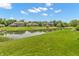 Scenic backyard view of the lake and surrounding homes at 7897 Hickory Ridge Ln, Mooresville, IN 46158
