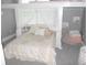 Bedroom with a bed beneath a small loft and a pink beanbag chair at 7897 Hickory Ridge Ln, Mooresville, IN 46158
