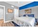 Bright bedroom featuring a large window, neutral walls, and ample natural light at 7897 Hickory Ridge Ln, Mooresville, IN 46158