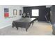 Game room featuring a pool table, arcade games, and a treadmill at 7897 Hickory Ridge Ln, Mooresville, IN 46158