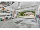 Spacious garage with an open door showing the front of the house at 7897 Hickory Ridge Ln, Mooresville, IN 46158