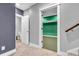 Hallway leads to finished basement with a bathroom and rec room for added comfort and convenience at 7897 Hickory Ridge Ln, Mooresville, IN 46158