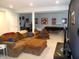 Expansive living room featuring a comfortable sectional, TV, and game area at 7897 Hickory Ridge Ln, Mooresville, IN 46158