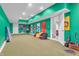 Finished basement boasts a spacious rec room, with beanbag chairs, sports flags, and room for games at 7897 Hickory Ridge Ln, Mooresville, IN 46158