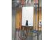 Modern tankless water heater with digital display and connected plumbing at 7897 Hickory Ridge Ln, Mooresville, IN 46158