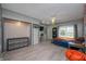Large bedroom with updated flooring and neutral gray walls at 8245 Woodlawn Dr, Martinsville, IN 46151