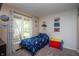 Bedroom with a neutral color palette and natural light at 8245 Woodlawn Dr, Martinsville, IN 46151
